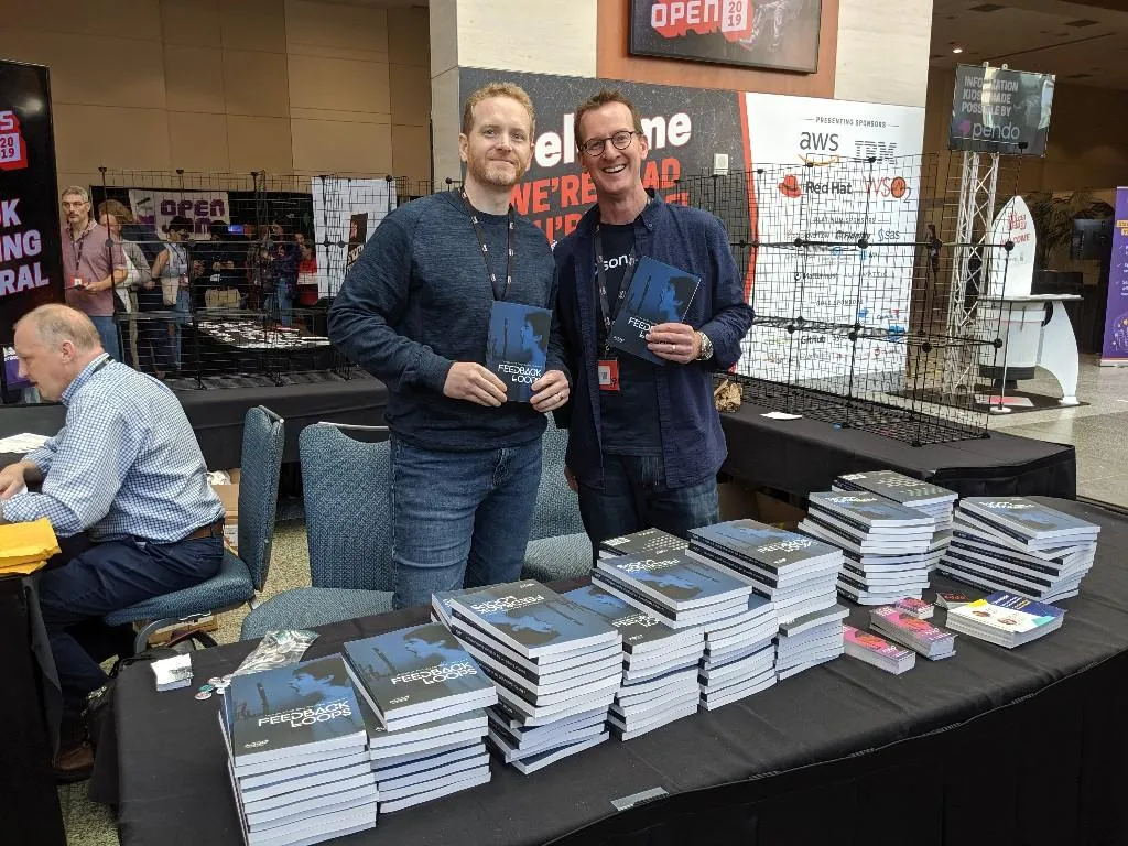 Derek Weeks and Lee at book signing at All Things Open